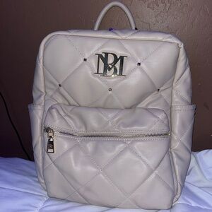 Baby Pink Quilted blush Bradley Mischak backpack with rhinestones.